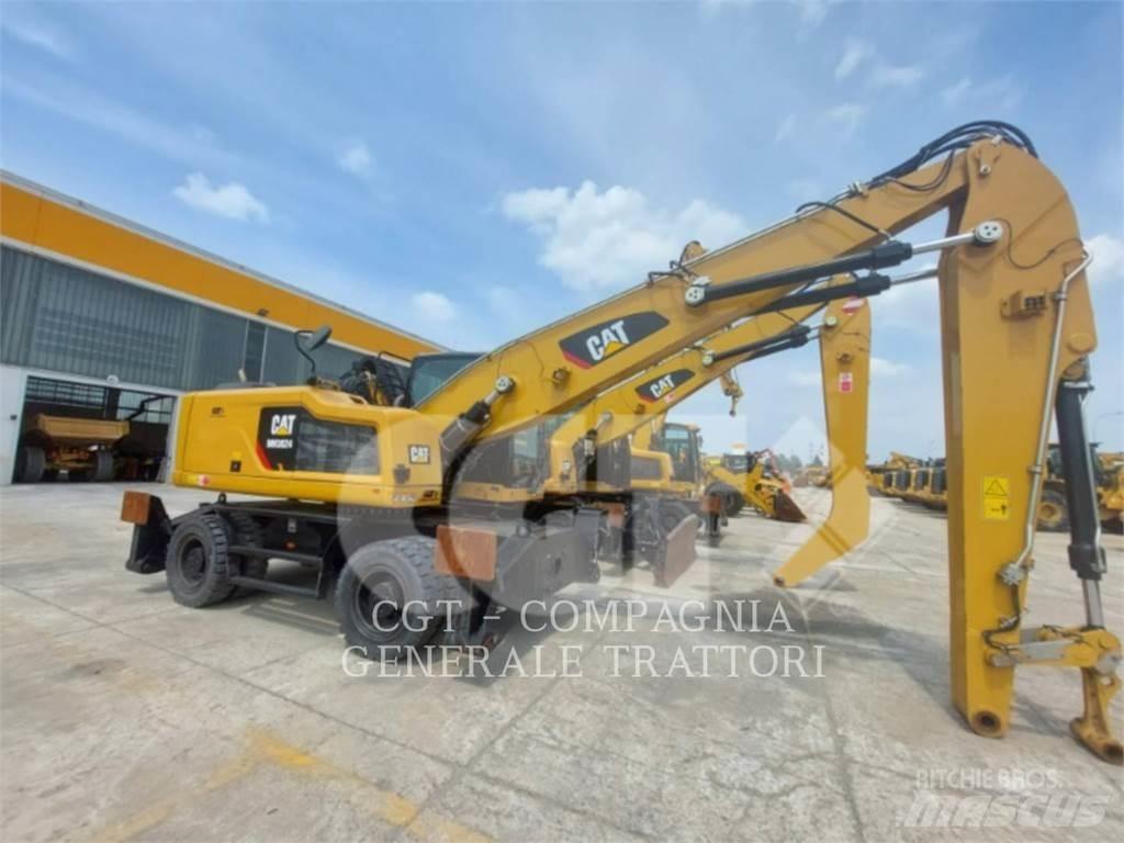CAT MH3024 Pelle sur pneus
