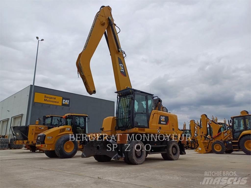 CAT MH3024 Pelle sur pneus