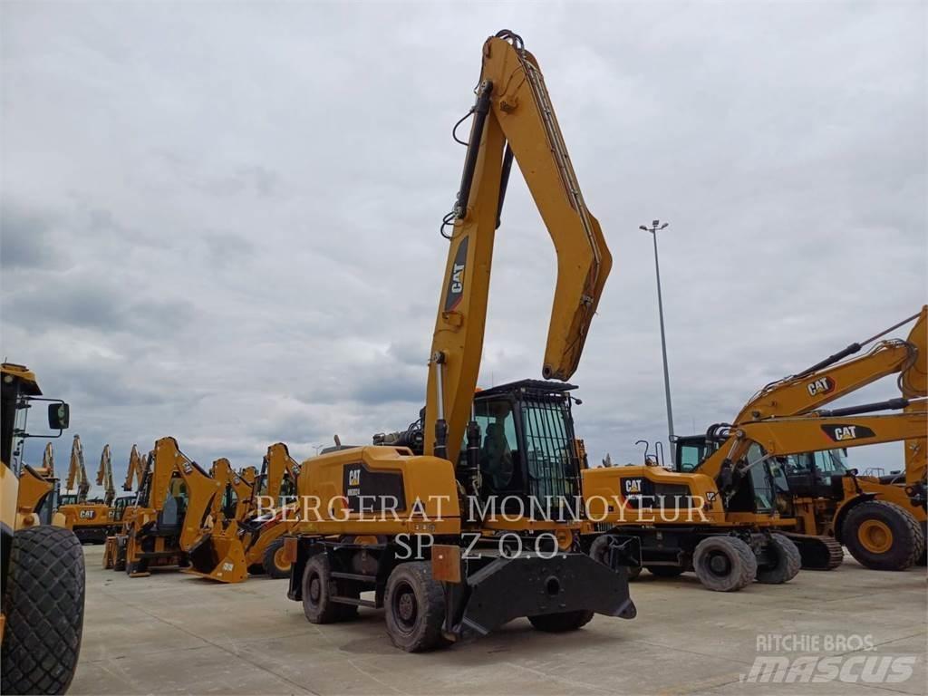 CAT MH3024 Pelle sur pneus