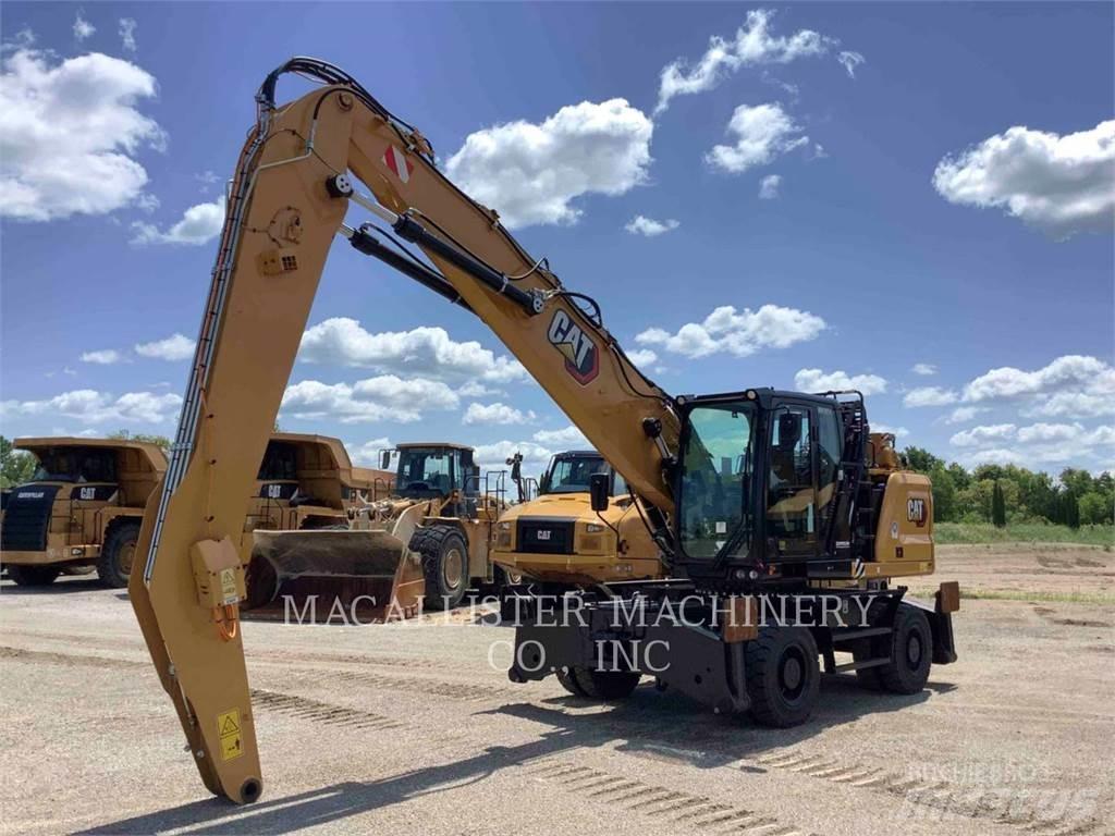 CAT MH3024 Pelle sur pneus
