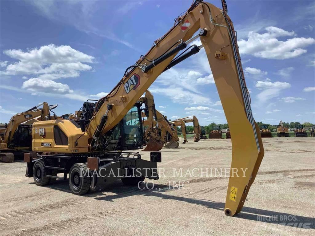 CAT MH3024 Pelle sur pneus
