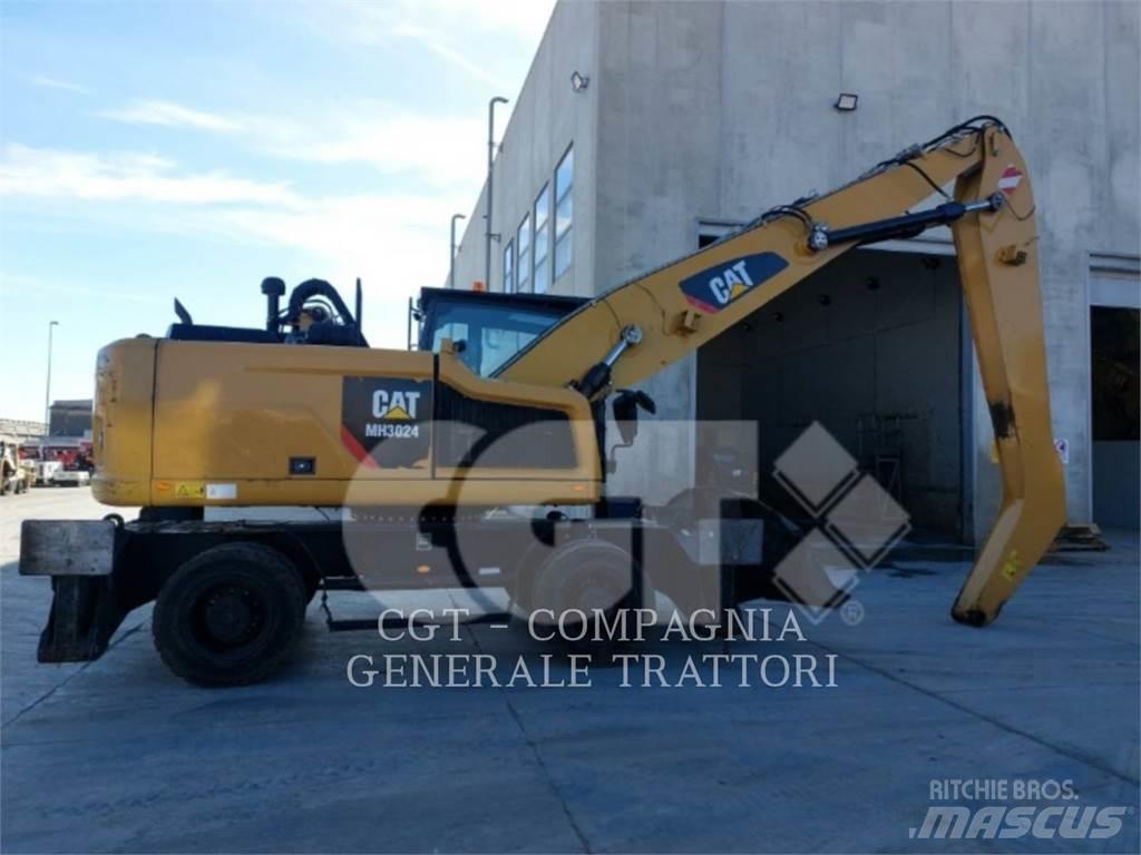 CAT MH3024 Pelle sur pneus