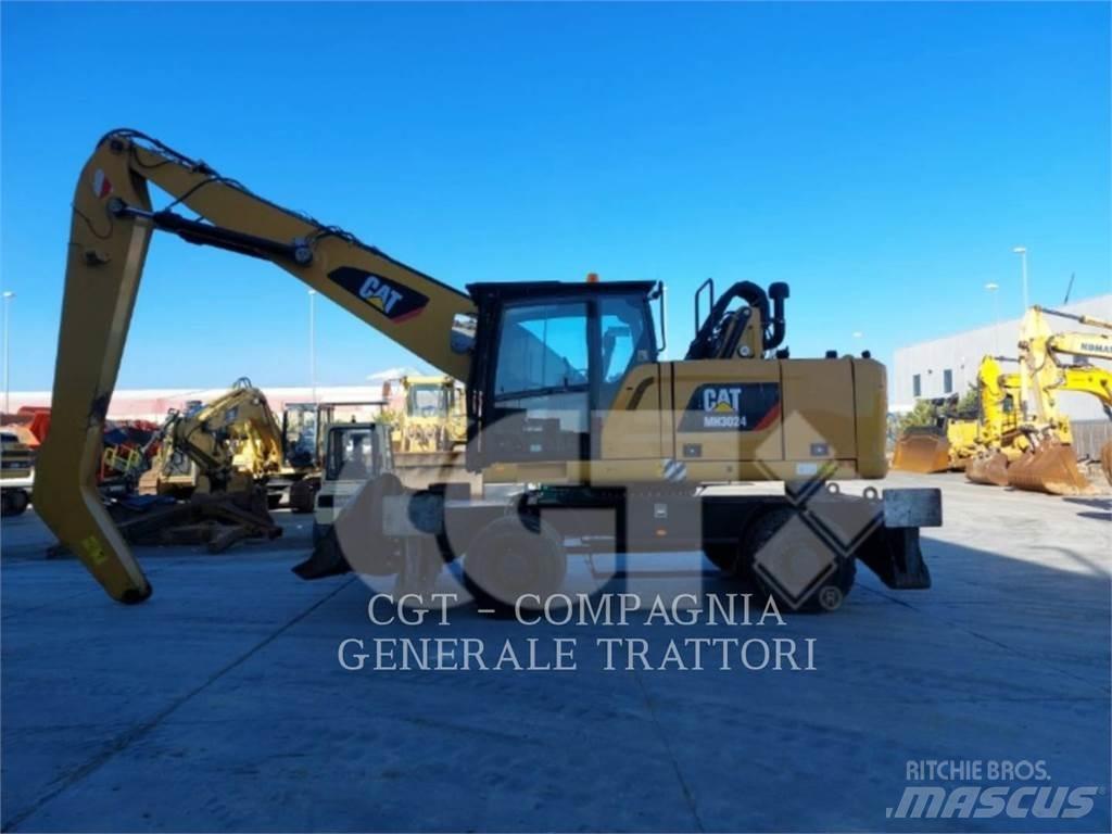 CAT MH3024 Pelle sur pneus