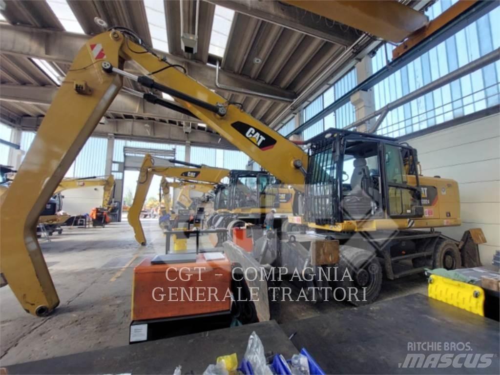 CAT MH3024 Pelle sur pneus