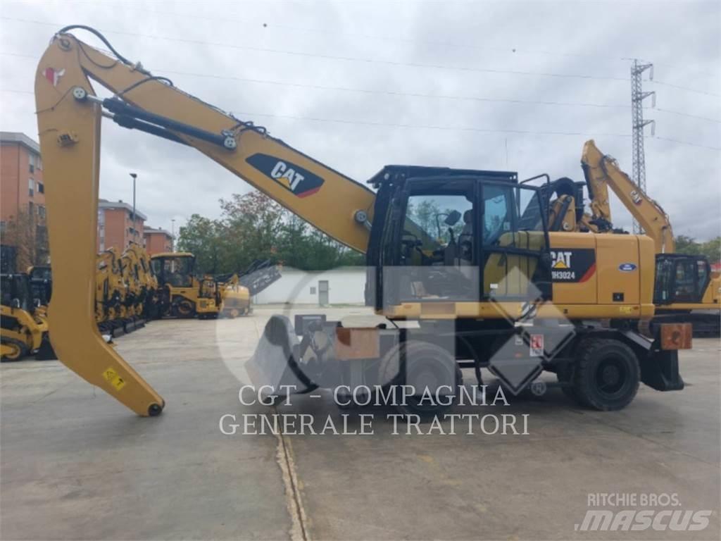 CAT MH3024 Pelle sur pneus
