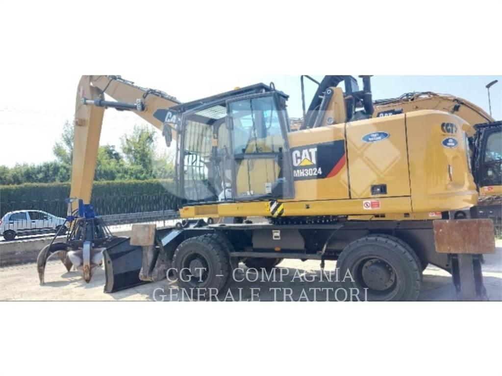 CAT MH3024 Pelle sur pneus