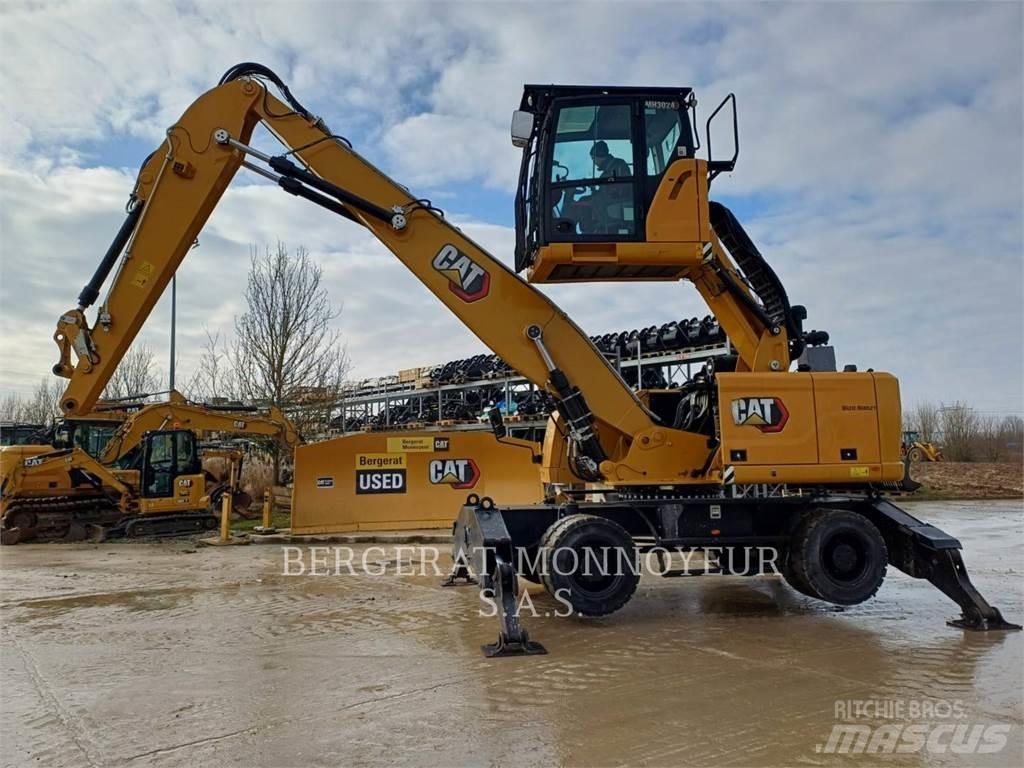 CAT MH3024 Pelle sur pneus