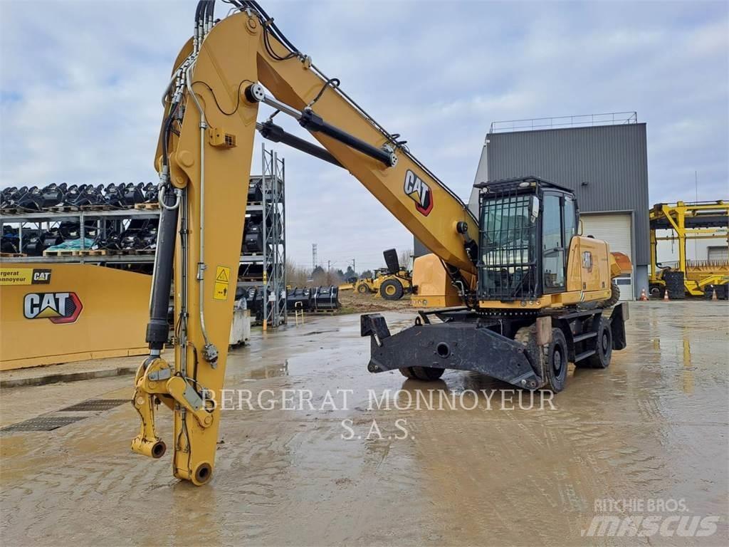 CAT MH3024 Pelle sur pneus