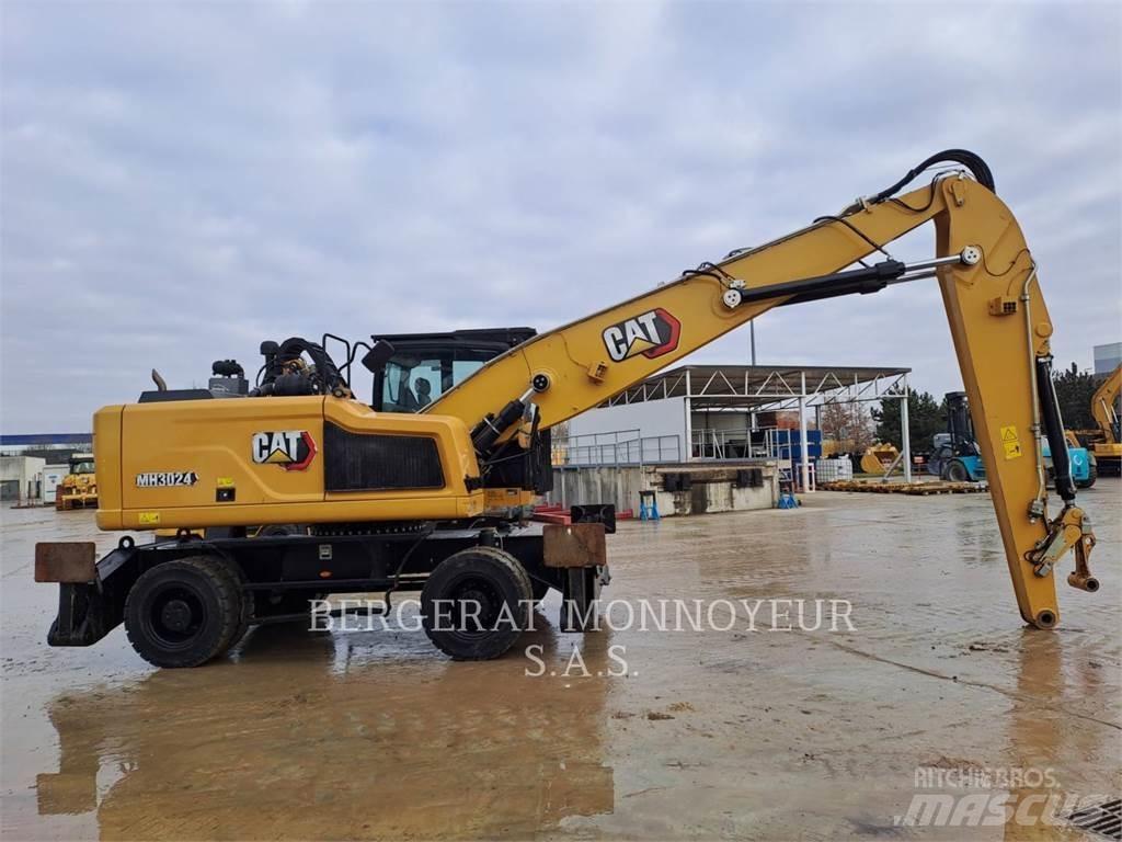 CAT MH3024 Pelle sur pneus