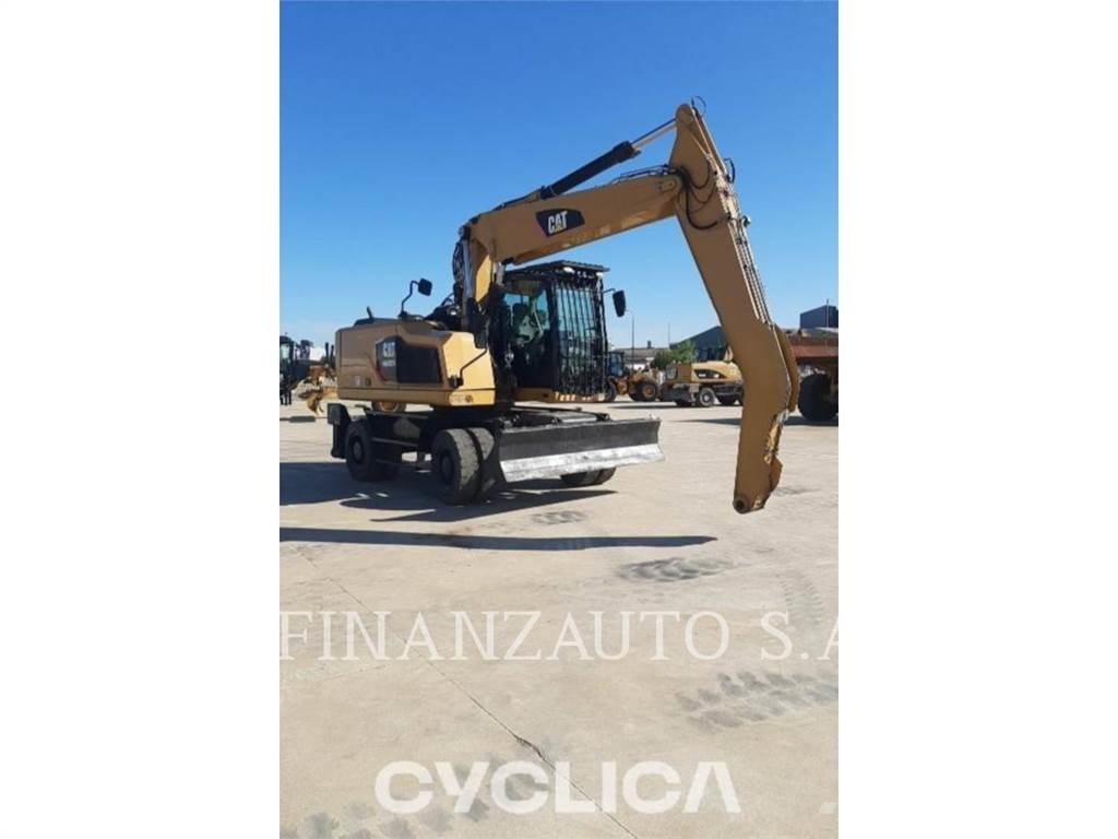 CAT MH3024 Pelle sur pneus