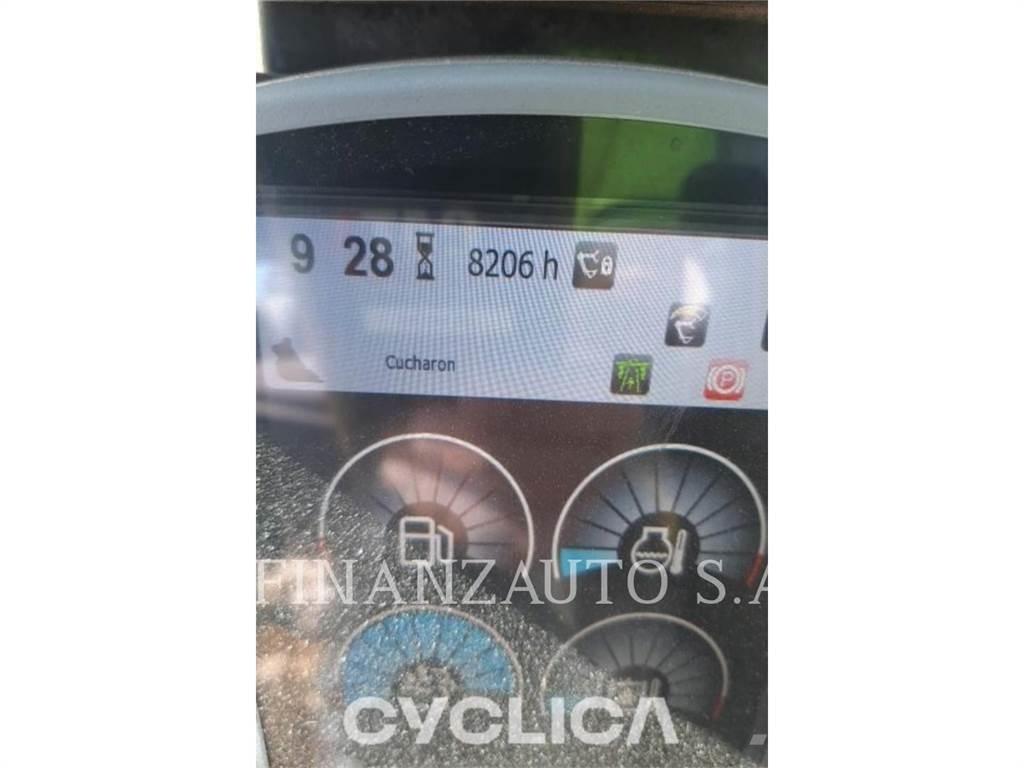 CAT MH3024 Pelle sur pneus