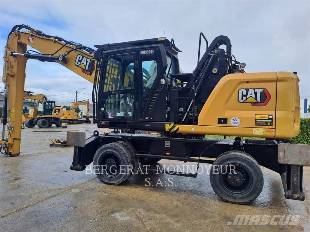 CAT MH3024 Pelle sur pneus