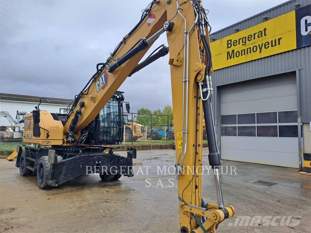 CAT MH3024 Pelle sur pneus