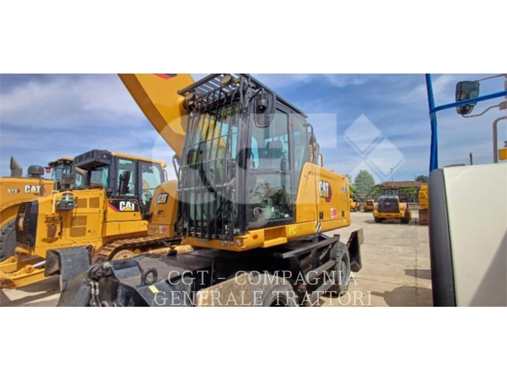 CAT MH3024 Pelle sur pneus