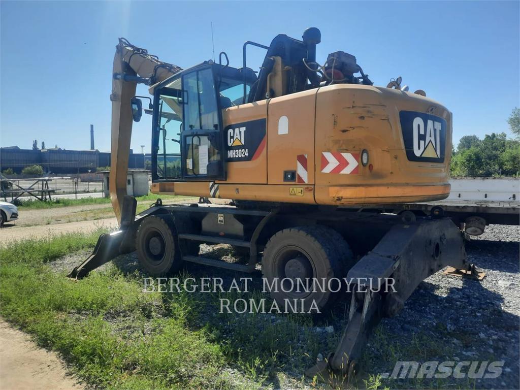 CAT MH3024-06 Pelle sur pneus