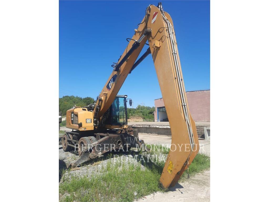 CAT MH3024-06 Pelle sur pneus