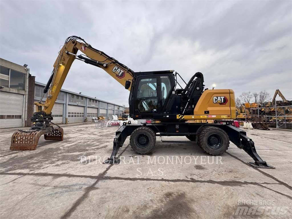 CAT MH3024-07 Pelle sur pneus