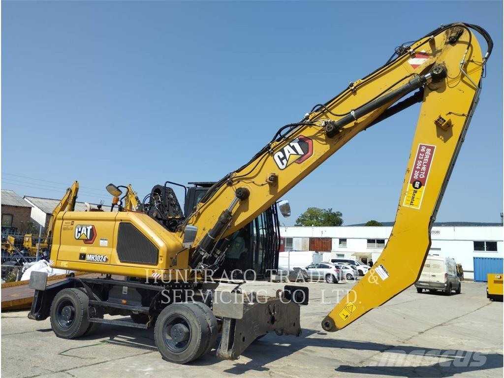 CAT MH3024-07 Pelle sur pneus