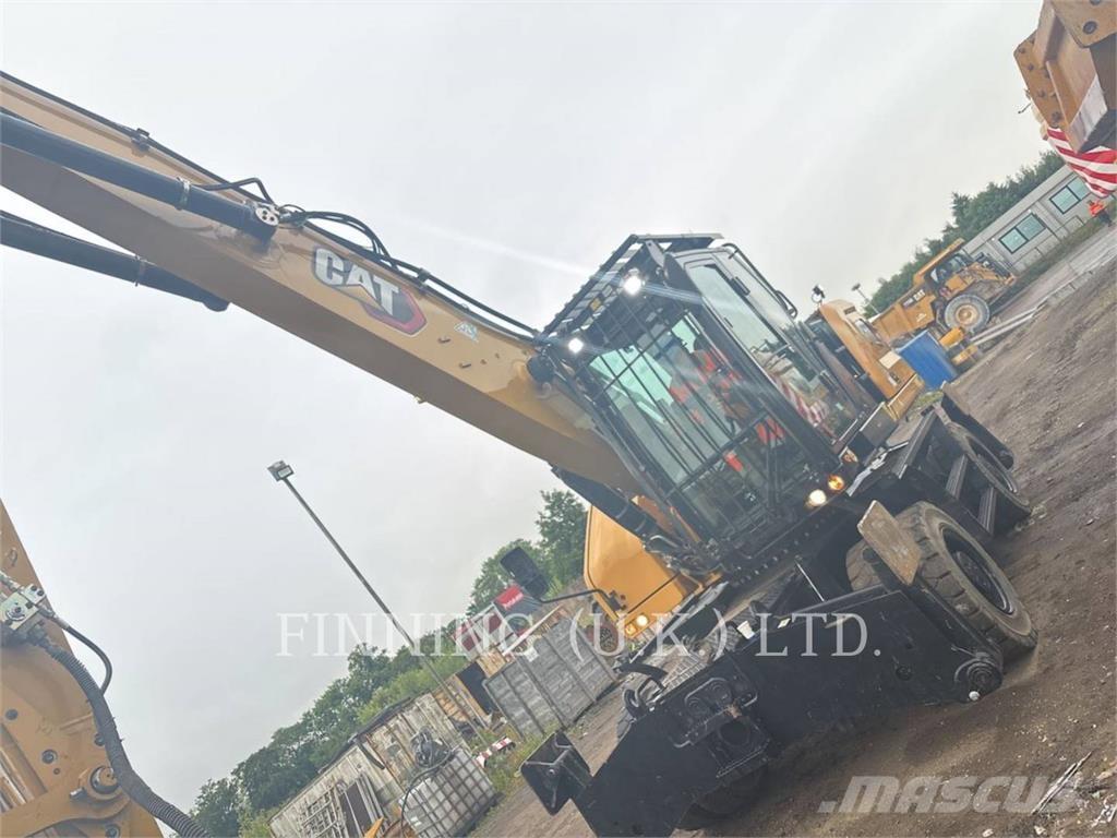 CAT MH3024 07W Pelle sur pneus