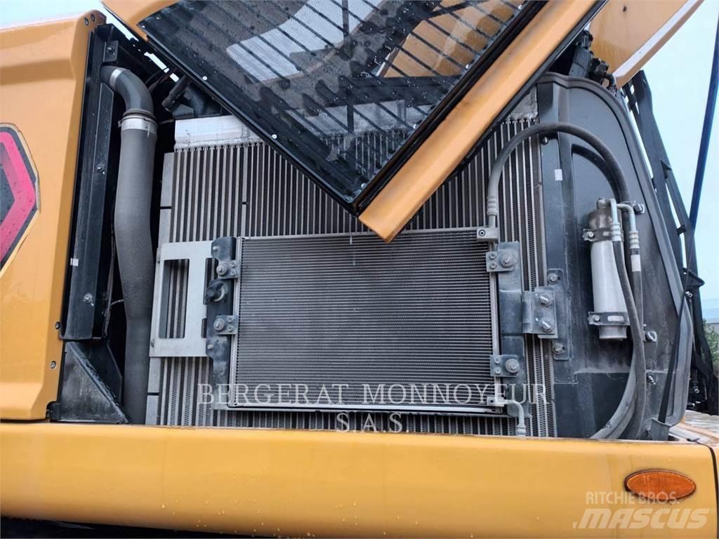 CAT MH3024-1 Pelle sur pneus