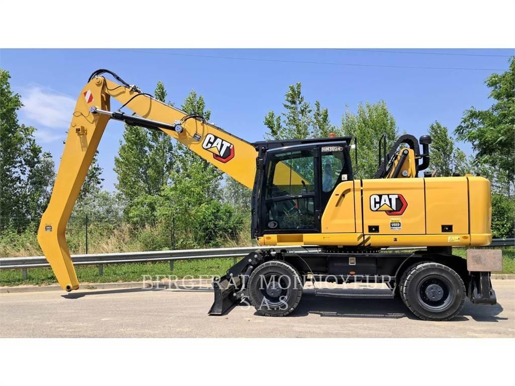 CAT MH3024-1 Pelle sur pneus