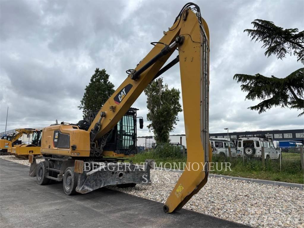 CAT MH3024-1 Pelle sur pneus
