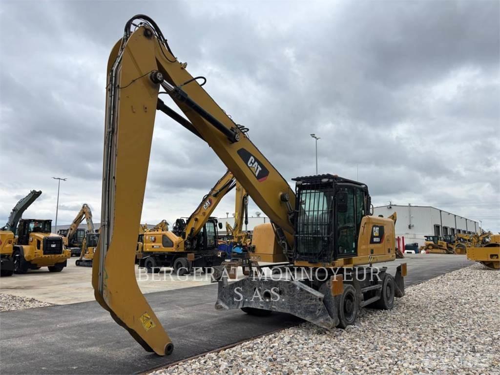 CAT MH3024-1 Pelle sur pneus
