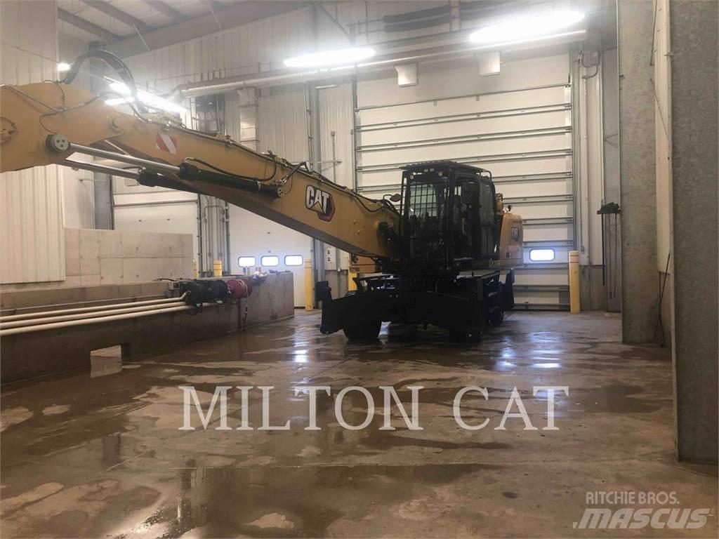 CAT MH3026 Pelle sur pneus