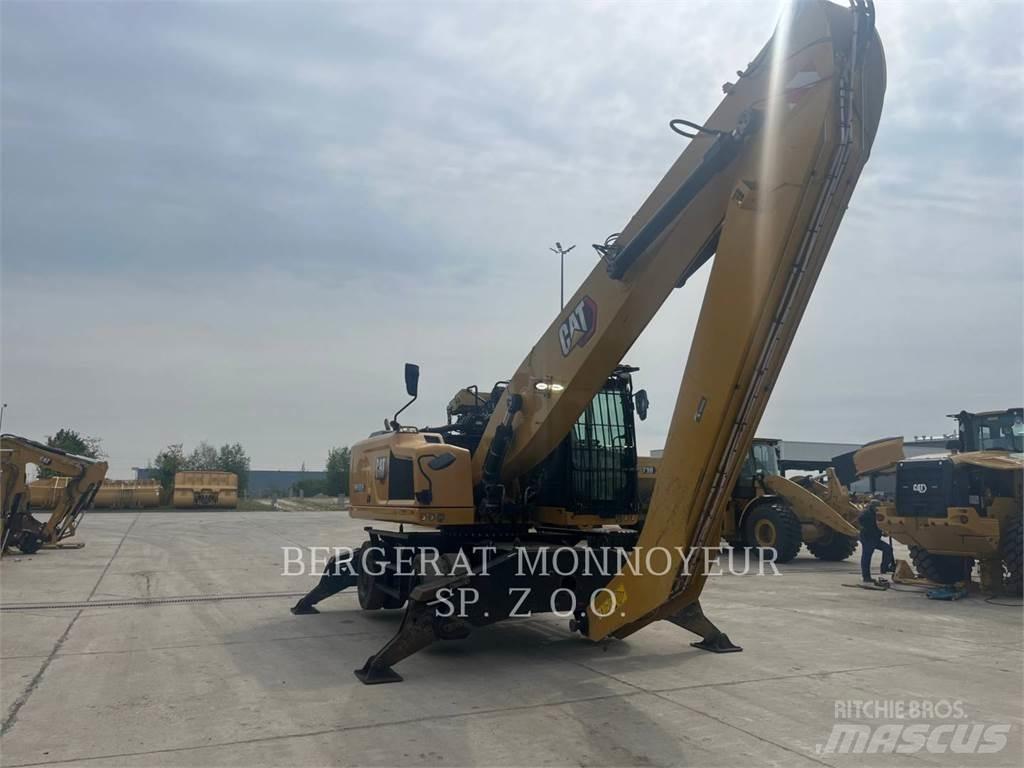 CAT MH3026 Pelle sur pneus