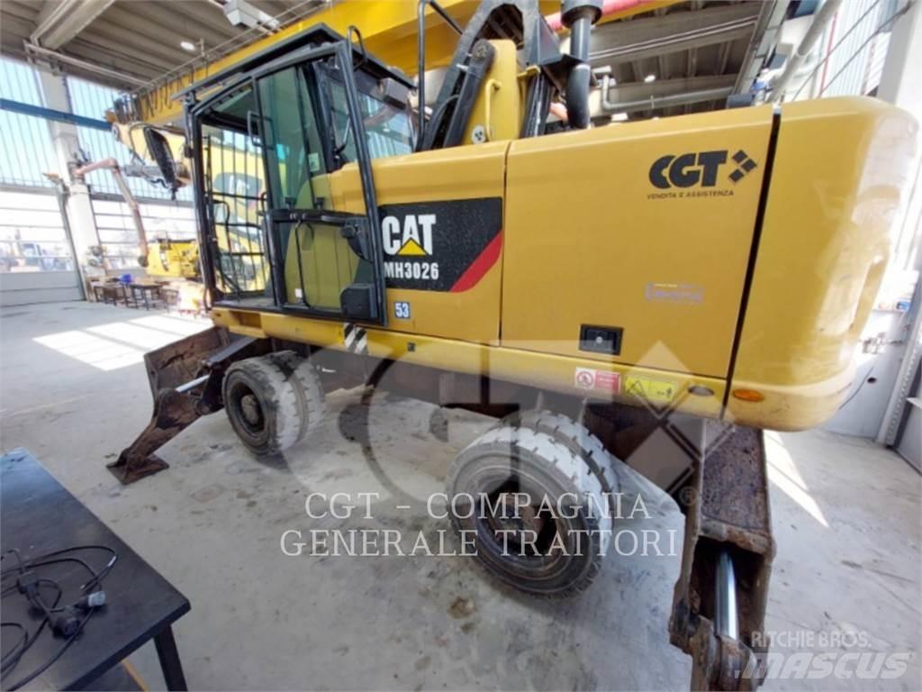 CAT MH3026 Pelle sur pneus