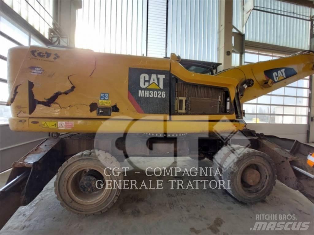 CAT MH3026 Pelle sur pneus