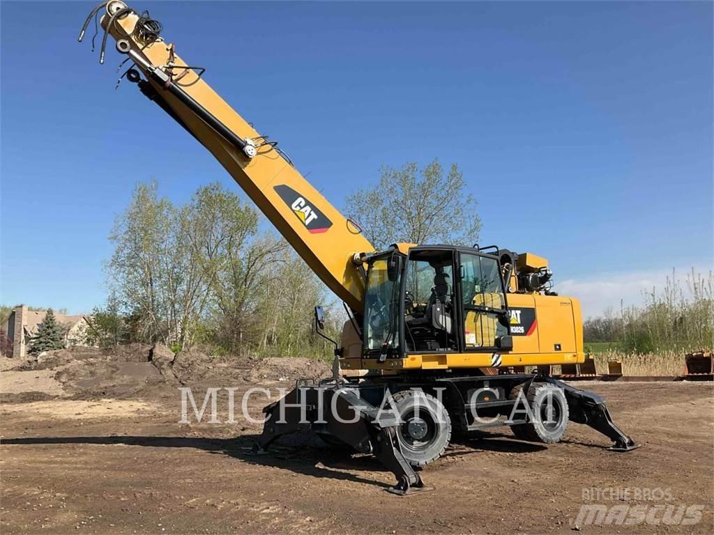 CAT MH3026 Pelle sur pneus