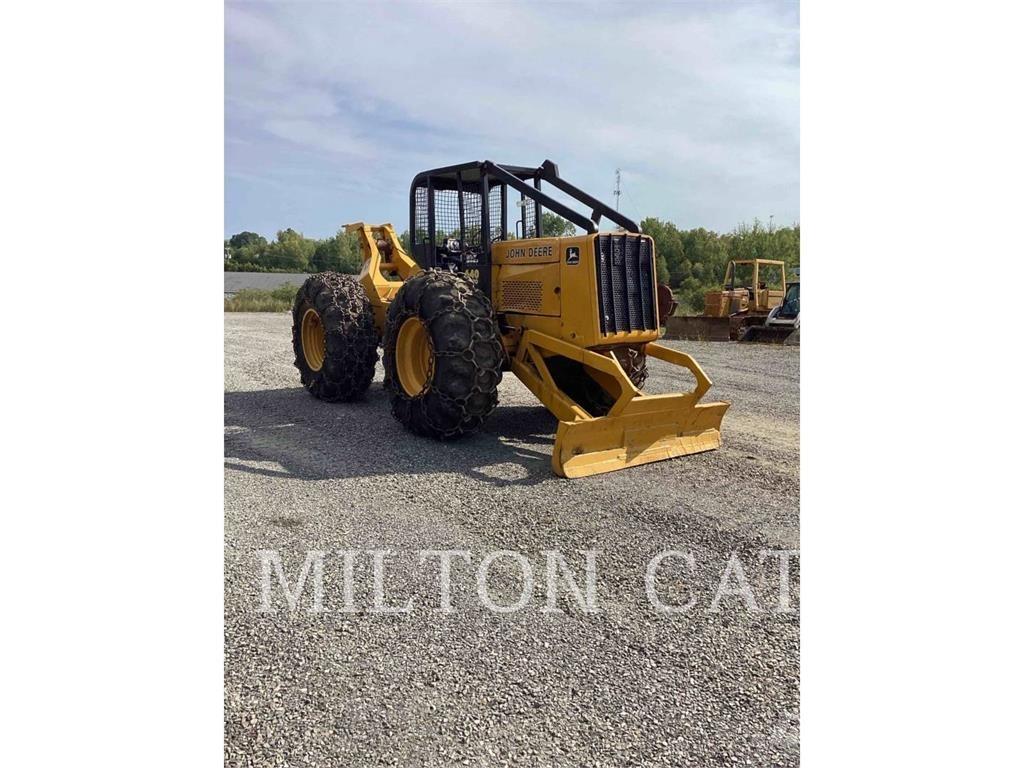John Deere 640 Débusqueur