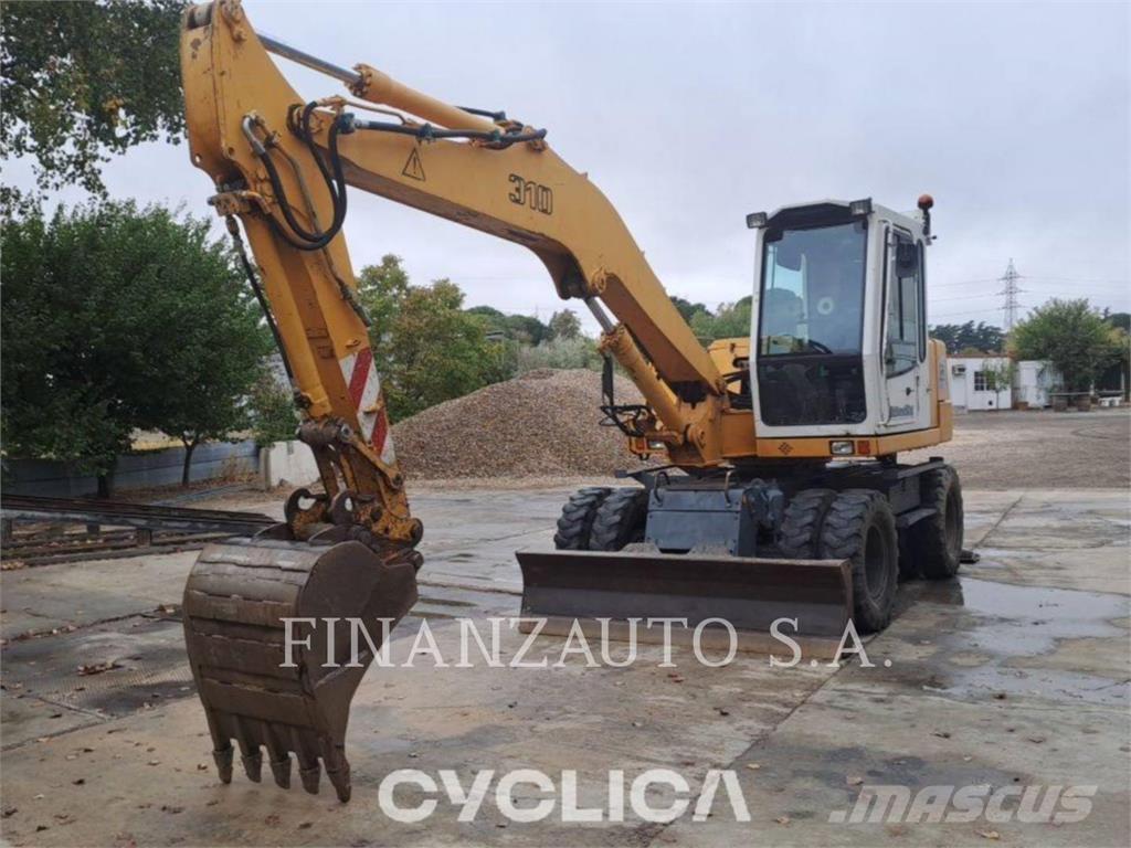 Liebherr A310B Pelle sur pneus