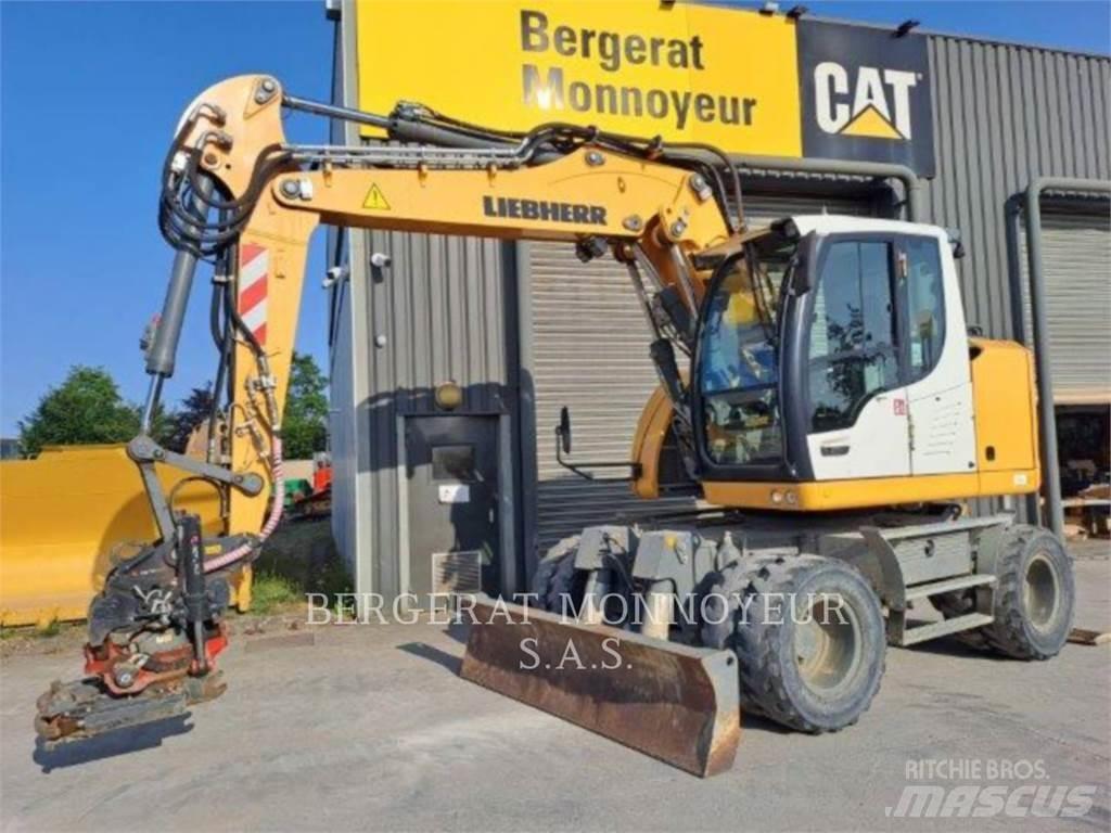 Liebherr A913 Pelle sur pneus