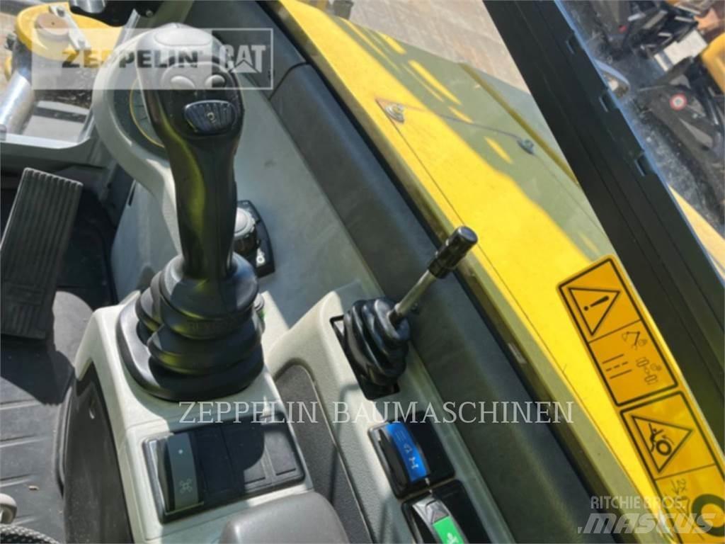Neuson EW100 Pelle sur pneus