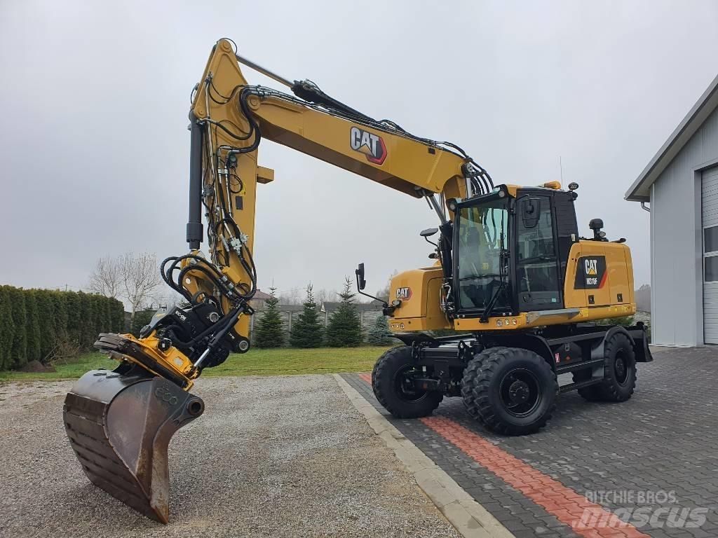 CAT M 318 F Pelle sur pneus