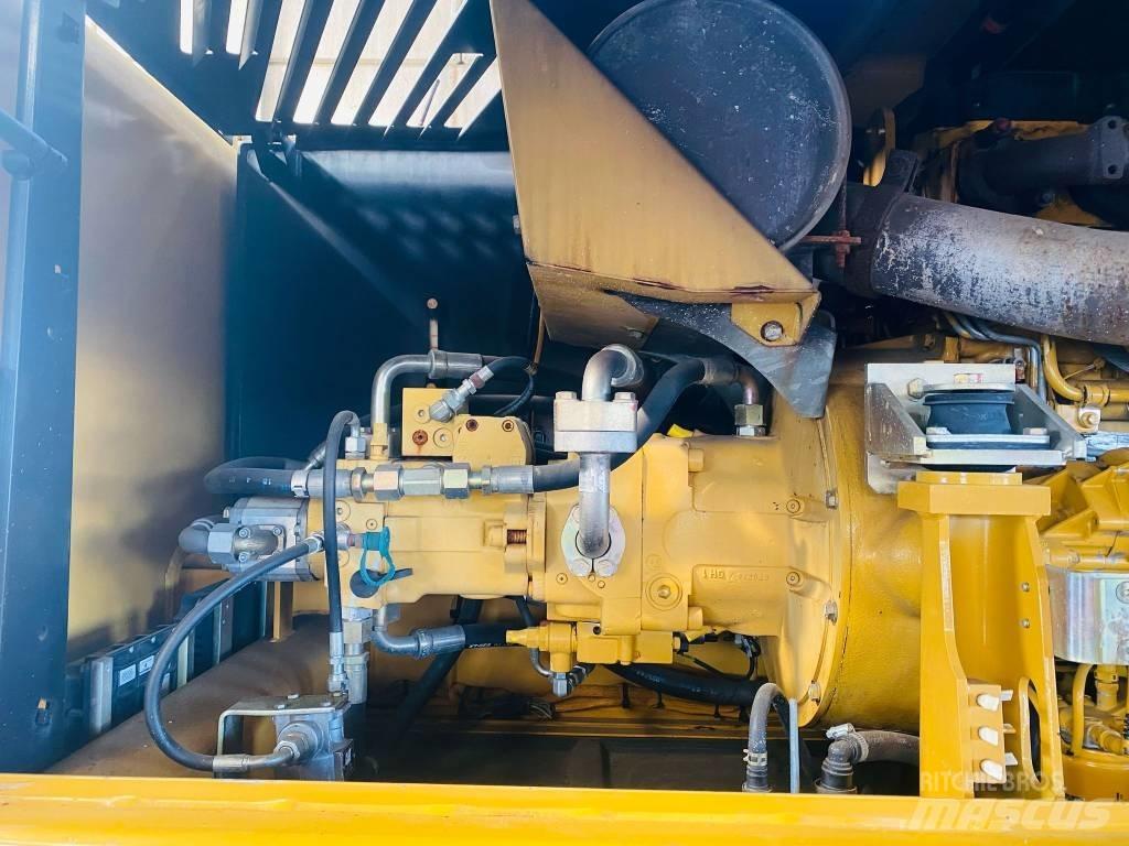 CAT M 318 D Pelle sur pneus