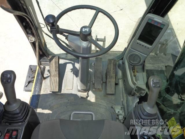 CAT M 318 D Pelle sur pneus