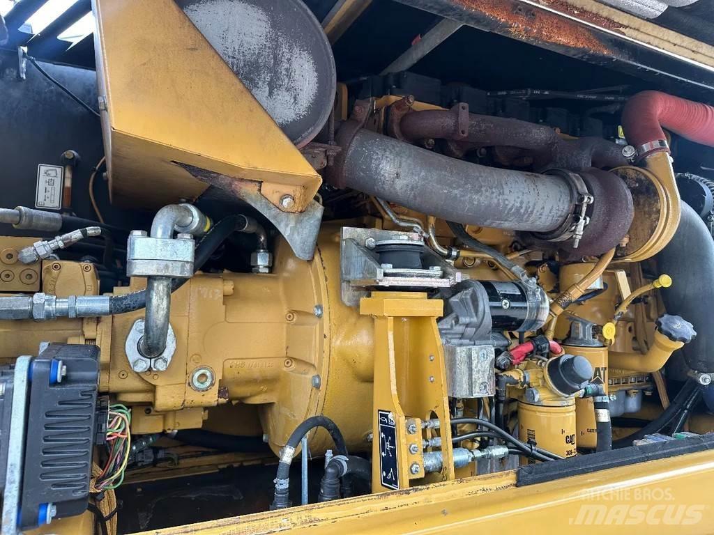 CAT M316D Pelle sur pneus