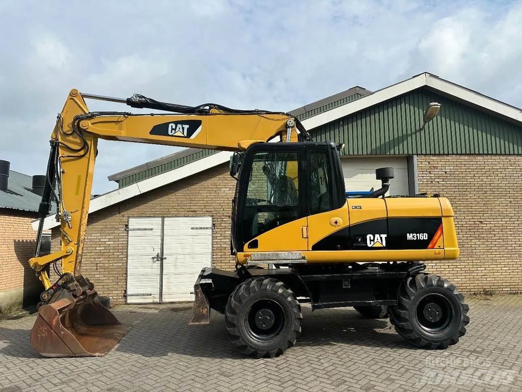 CAT M316D Pelle sur pneus