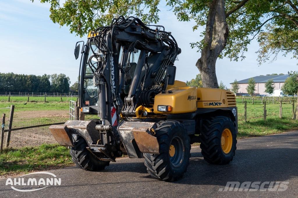 Mecalac 12 MXT Pelle sur pneus