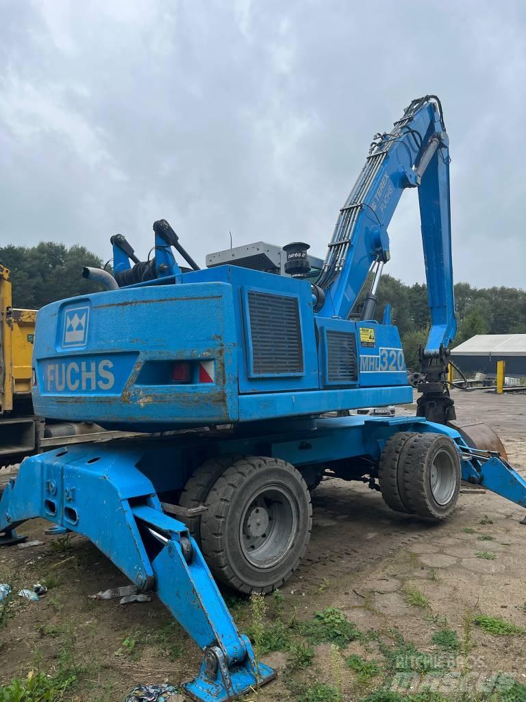 Fuchs MHL 320 Pelle sur pneus