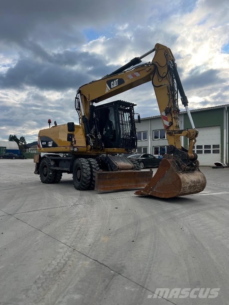 CAT M 316 D Pelle sur pneus