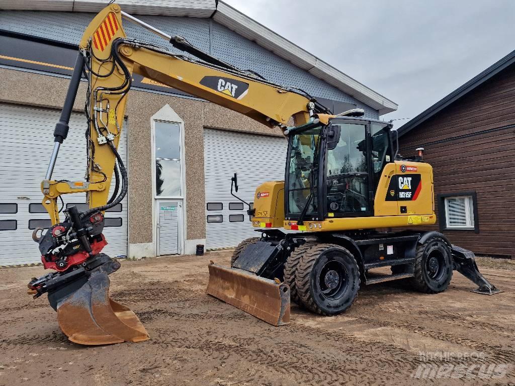 CAT M 315 F Pelle sur pneus