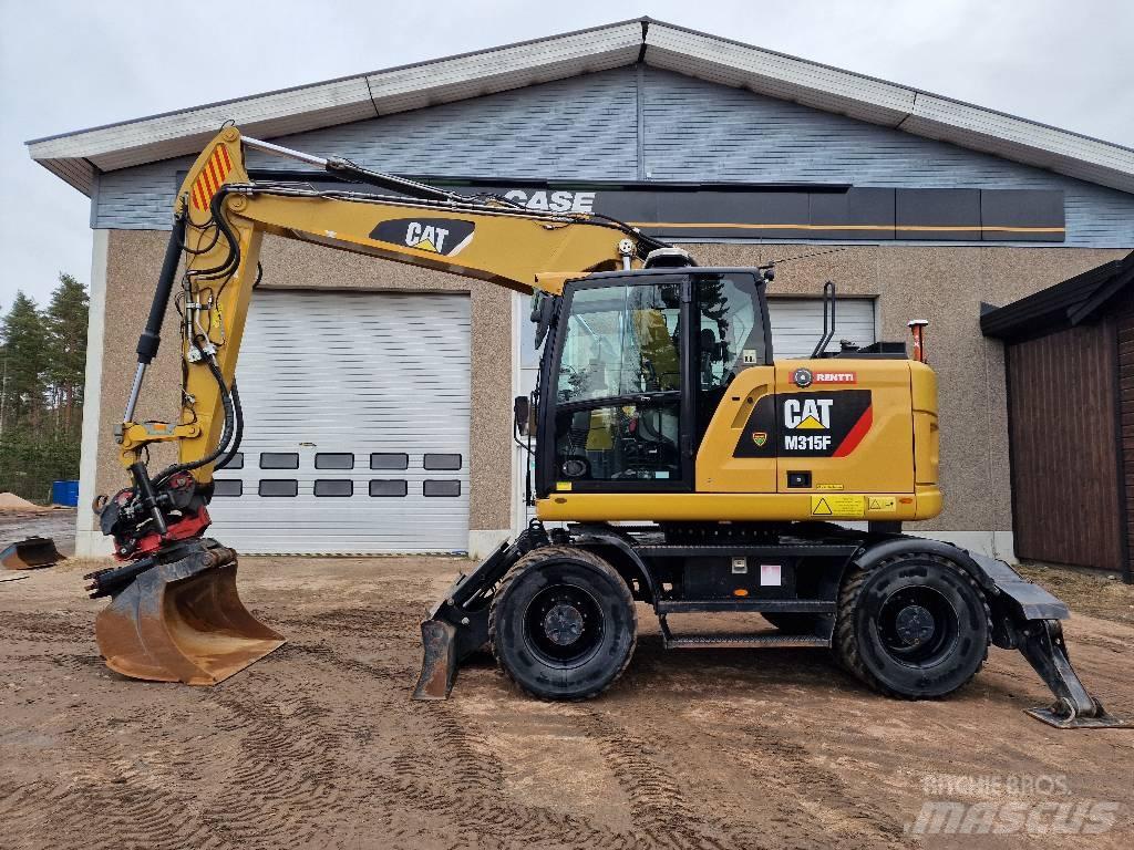 CAT M 315 F Pelle sur pneus