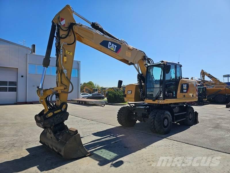 CAT M 320F Pelle sur pneus