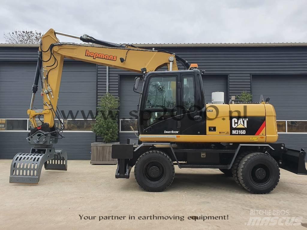 CAT M316D Pelle sur pneus