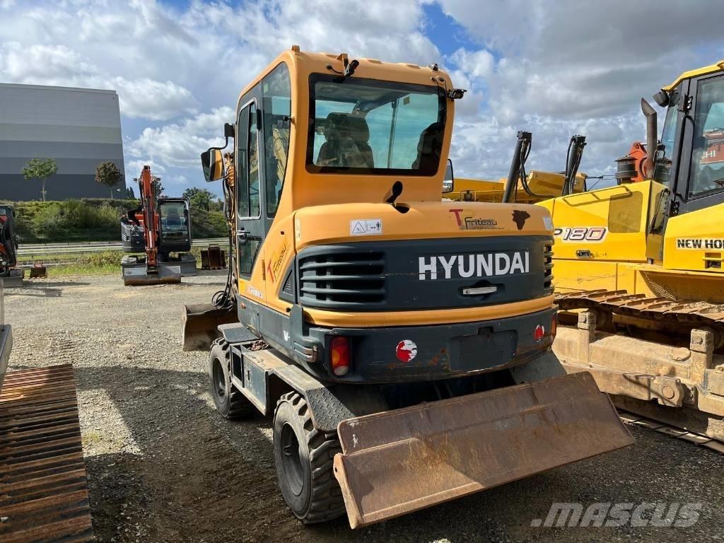 Hyundai R55W-9 Pelle sur pneus