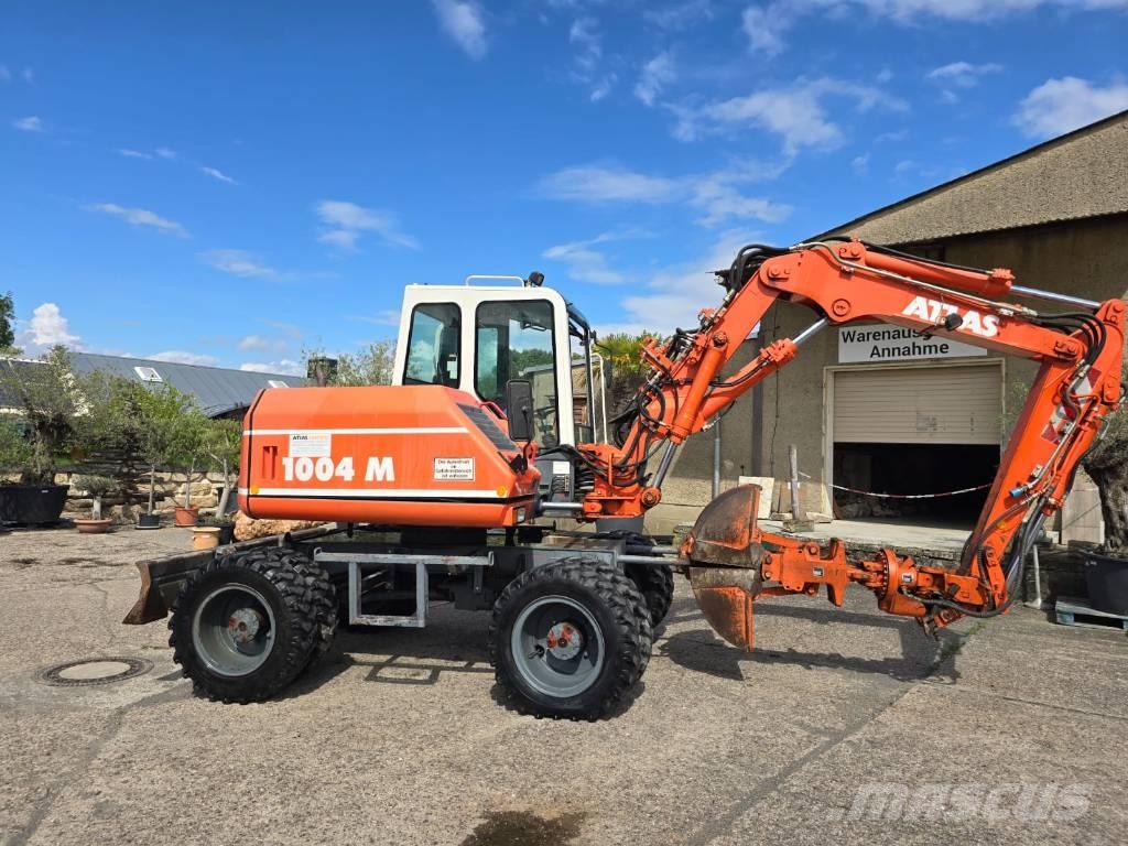 Atlas 1004M Pelle sur pneus